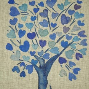 closer look at a cushion in Blue Hearts Tree print.