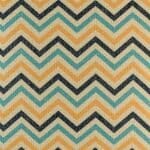 Closer look at cushion with chevron design in Teal Yellow and Navy colours.
