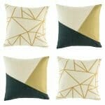 a pair of tri colour cushion cover and gold geometric cushion cover.