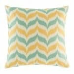 cushion with Teal and Yellow Chevron pattern.