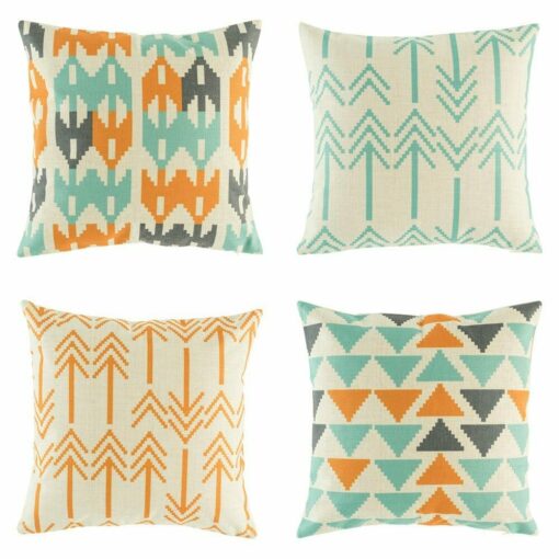 two cushion with arrow design, two cushion with arrow head and triangle design in Orange and Teal colours.