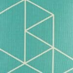closer look at cushion cover with Teal Geometric pattern.