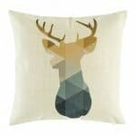 cushion with Gold Stag Geometric pattern.