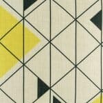 closer look at cushion with Black and Yellow Trellis pattern.