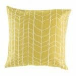 cushion with Gold Chevron pattern.