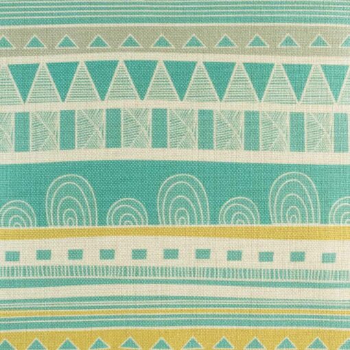 closer look at cushion with Teal Aztec pattern.