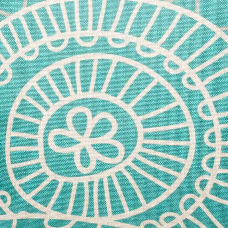 closer look at cushion cover with Teal Twirl pattern.