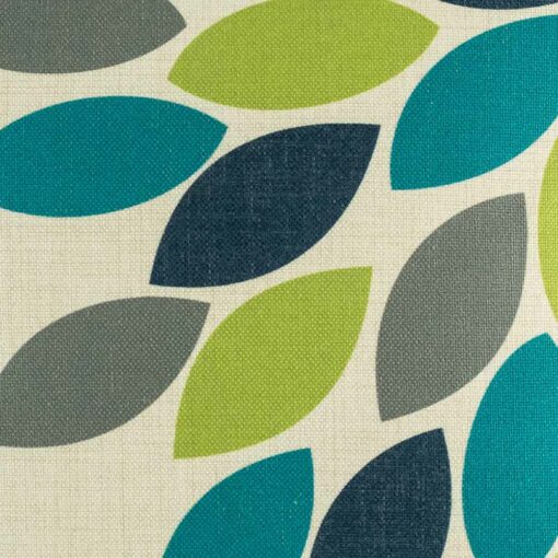 closer look at cushion cover with Apple Green and Teal Petal pattern.
