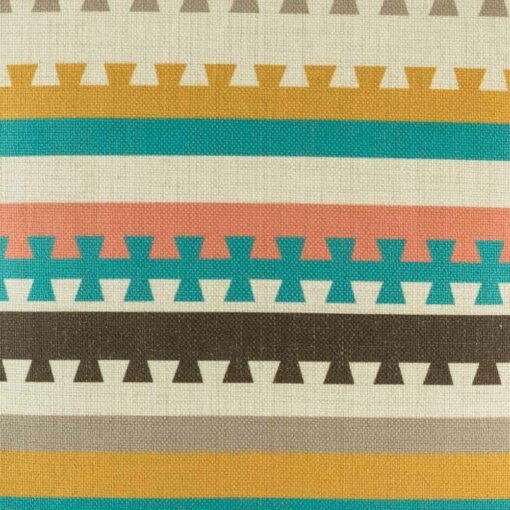 closer look at cushion with Teal and Mustard Aztec pattern.