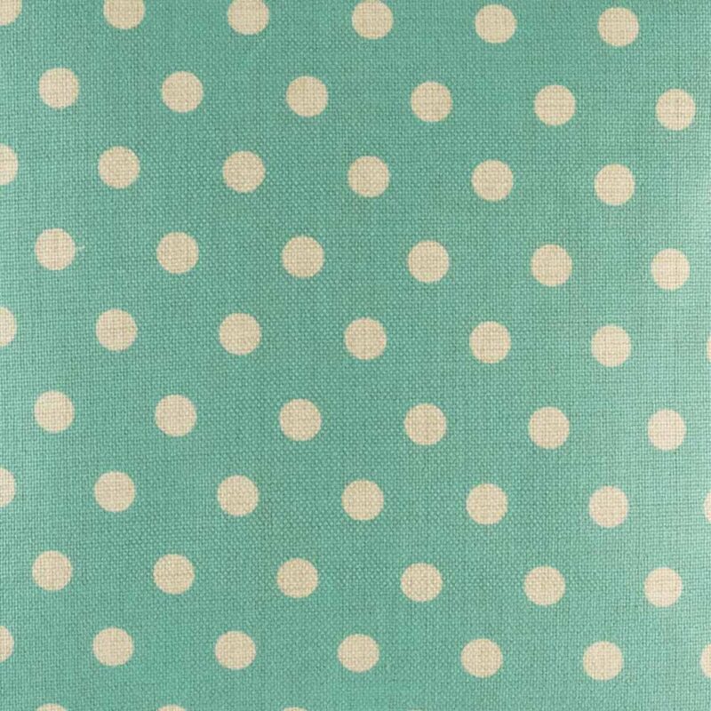 closer look at cushion with Teal and White Polka Dots pattern.