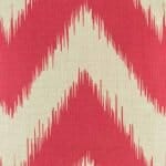 closer look at cushion cover with Red Tasseled Chevron pattern.