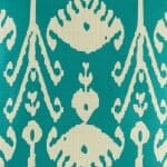 closer look at cushion with Turquoise Ikat pattern.