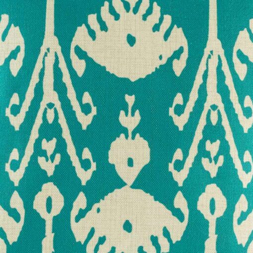 closer look at cushion with Turquoise Ikat pattern.