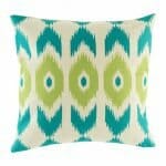 cushion cover with Turquoise and Lime Ikat pattern.