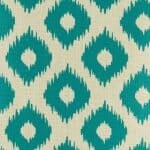 closer look at cushion with Turquoise Ikat pattern.