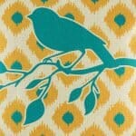 closer look at cushion cover with Bird Ikat pattern.