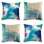 Four cushion with dyed design in blue tones.
