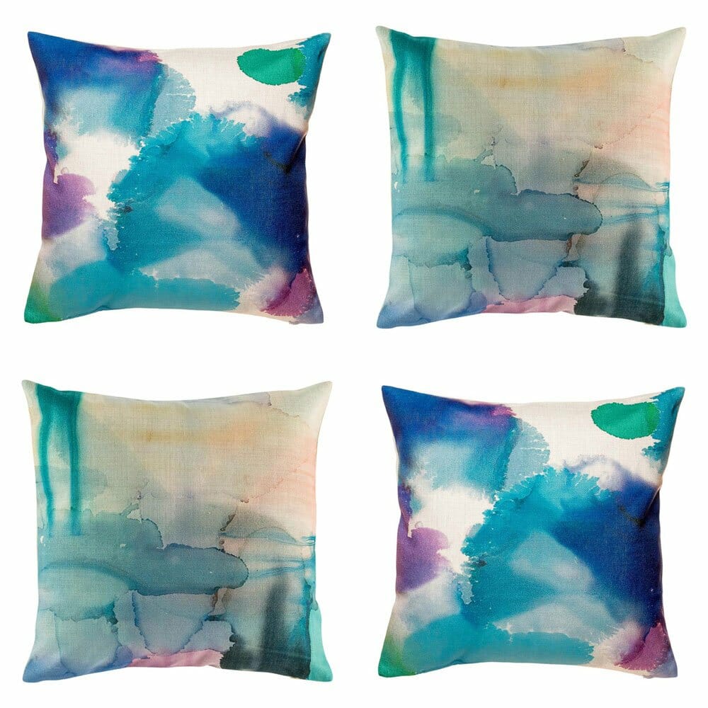 Four cushion with dyed design in blue tones.