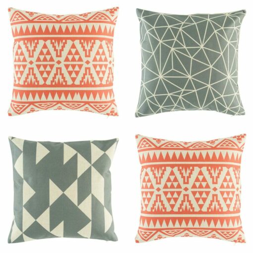 4 cushion in grey and punch colours with tribal and geometric patterns.