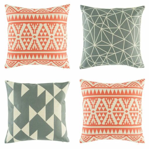 4 cushion in grey and punch colours with tribal and geometric patterns.