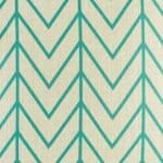 closer look at cushion with Teal Thin Chevron pattern.