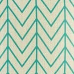 closer look at cushion with Teal Thin Chevron pattern.