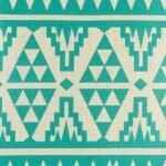 closer look at cushion with Teal Tribal pattern.
