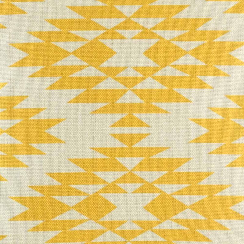 closer look at cushion cover with Gold Ikat pattern.