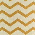 closer look at cushion with Gold Chevron pattern.