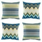 4 cushion with stripe and chevron patterns in Olive and Blue colours.