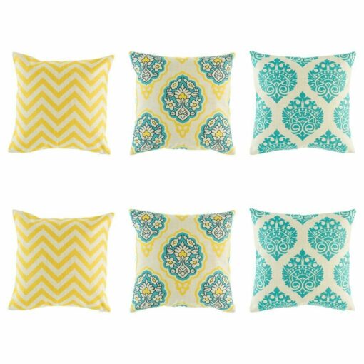 3 pairs of patterned cushion with chevron and ikat patterns in Yellow and Teal colours.