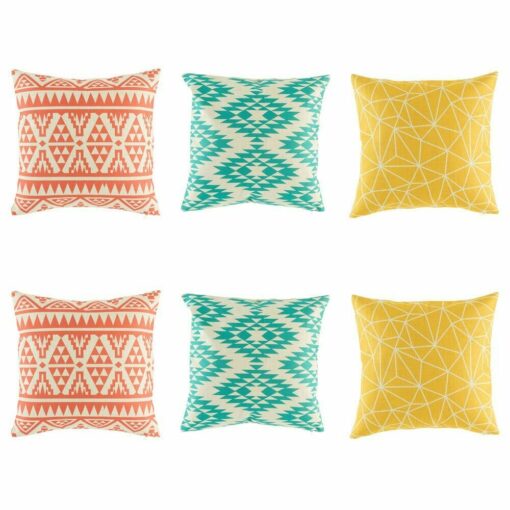 Three Pairs of Multi Patterned cushion with tribal, ikat and geometric patterns in orange,teal and yellow colours.