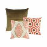 Two patterned cushion cover in red and brown, and one cushion cover in plain red