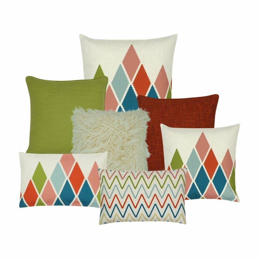 Three diamond design cushion cover,two plain,one fur and one zigzag in square and rectangular shapes in red,green and white colours.