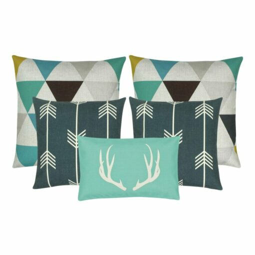 2 patterned cushion cover in teal grey and brown, a pair of grey and white arrow cushion cover and 1 rectangular cushion with antlers design