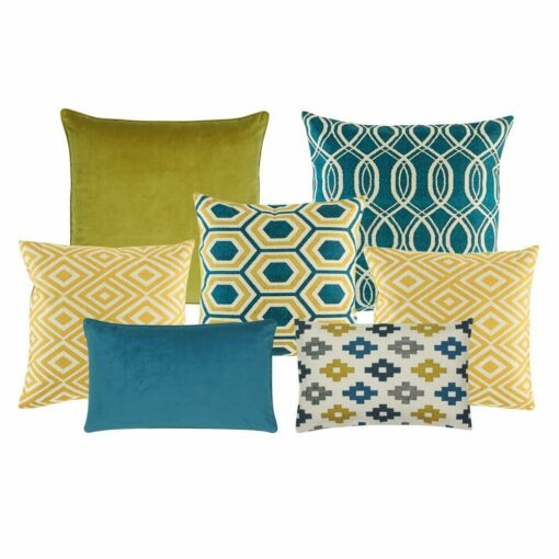 Four multi patterned square and rectangular cushion with diamond, plain and spiral designs in blue and gold colours.