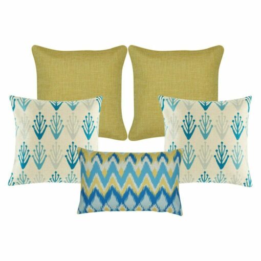 A pair of gold cushion, a pair of cushion in plant design and one chevron design cushion.