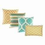 4 multi patterned cushion covers with diamond, aztec and chevron designs in yellow and teal colours.