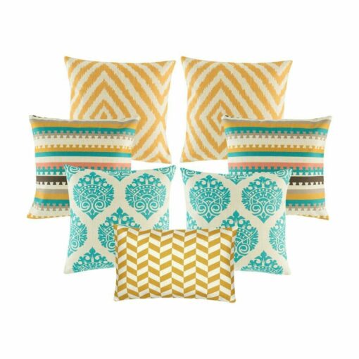 Four multi patterned cushion in gold and teal colours with diamond, zigzag and crown designs.