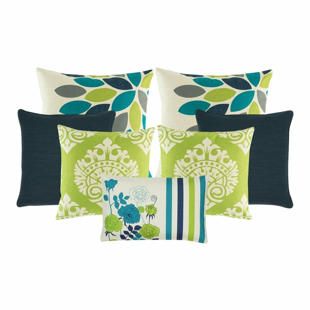 2 large cushion cover in lime, teal and grey hues. 2 plain square cushion. A pair of patterned cushion in lime and white and 1 rectangular cushion with floral designs