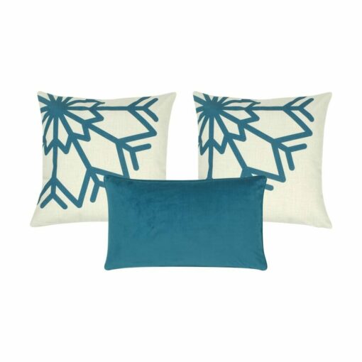 blue and white snowflake cushion cover and a rectangular cushion cove in blue.