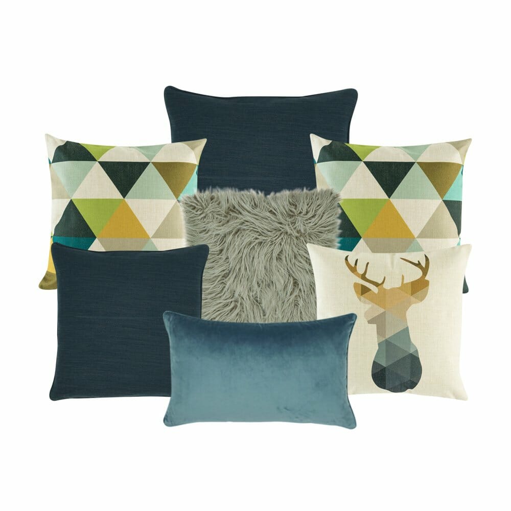 A pair of cushion cover with triangular design, one grey fur cushion, two deep blue cushion, one moose printed cushion and one rectangle cushion cover