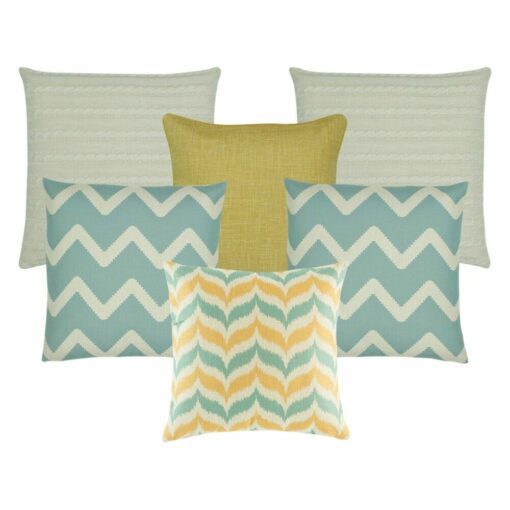 A pair of cable knit cushion, one gold cushion, a pair of chevron pattern cushion and one patterned cushion in gold and skyblue colours.