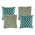 two grey fur textured cushion, and two blue and white patterned cushion