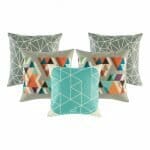 2 grey patterned cushion cover, 1 grey and orange cushion cover and 1 teal and white patterned cushion cover