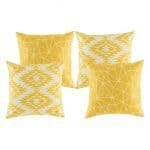 Four Geometric patterned cushion covers in yellow colour.