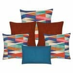 Three pieces of multi coloured cushion, a pair of burnt orange cushion and 1 rectangular cushion