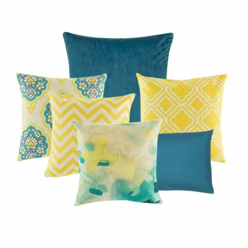 One plain blue cushion cover, four multi patterned cushion cover in hues of yellow, blue and white. and one rectangular cushion cover.