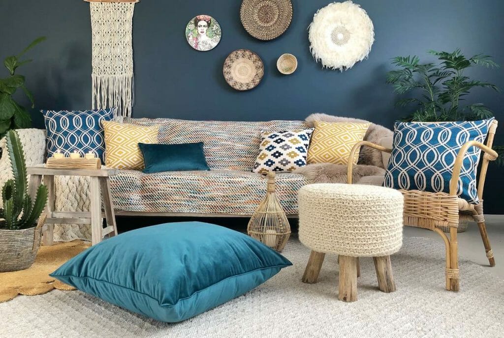 Bohomenian patterned cushions in shades of blue and a large floor cushion for a cozy finish.