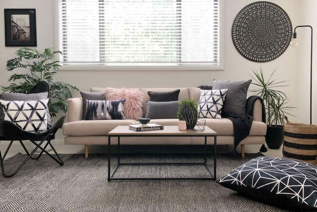 Bold black and white accent cushions to highlight the contemporary look of the room.